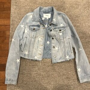 Preowned Pistola denim jacket with white embroidered stars. Raw hem. Size xs.
